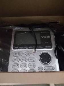 lot 200 image: Vtech desktop phone. Brand new stil...