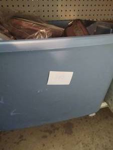 lot 223 image: Tote full of hard cases Tote not in...