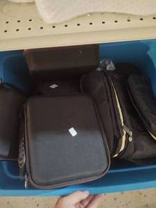 lot 227 image: Tote Full of hard cases, good stash...