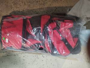 lot 250 image: Brand new rolling duffle bag 31x15...