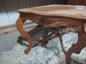 lot 254 image: Solid wood coffee table with ornate...