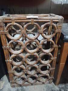 lot 257 image: Brown wicker 15 spot wine rack 10x1...