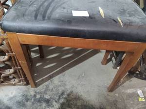 lot 258 image: Wooden with black leather bench it ...