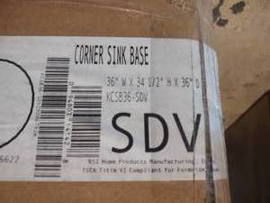 lot 285 image: Corner sink base still in box 36x3...