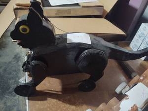 lot 299 image: Hand made wooden pull dog black...