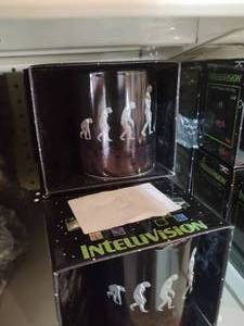 lot 3 image: 7 Intellivision color changing mugs...