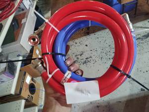 lot 41 image: Eastman blue and red water hose...