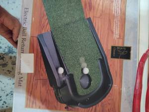 lot 43 image: Electric ball return putting mat go...