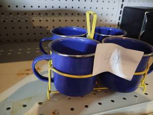 lot 49 image: 4 blue tin cup with yellow rack...