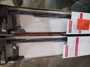 lot 132 image: 2 Delta 24 towel bar Matte black f...