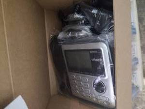 lot 201 image: Vtech desktop phone. Brand new stil...