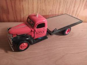 lot 213 image: 1941 Chevrolet Flatbed Truck Ajax Towing Services Model Truck