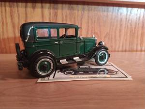 lot 214 image: 1928 Chevrolet Imperial Landau Four Door Sedan Model Car By National Motor Museum Mint