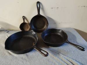 lot 328 image: Four Cast Iron Skillets