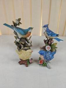 lot 192 image: Lot of (4) Bird Figurines by Homco Blue and Yellow Birds 