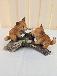 lot 62 image: Adorable Homco Baby Foxes Playing on Log