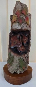 lot 26 image: Paul R. Carrico Hiding Places Red Fox Family Carving Limited Edition