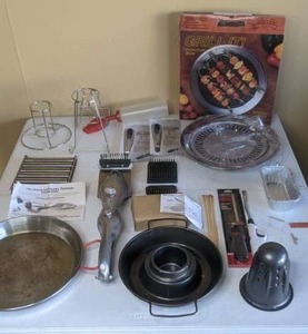 lot 299 image: Grilling Accessories - Grand Grill Daddy Platinum Steam Cleaner Brush, Grill It Indoor Grill, Reusable Color Changing Meat Thermometers, Beer CanSteamer Stands, Basting Bottle, and more