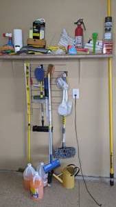lot 286 image: Miscellaneous GarageCleaning Items - Mr. Long Arm, Water Pitcher, Level, Cleaning Products & More