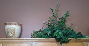 lot 216 image: Decorative Clay Pot w Pears Design & Artificial Floral Arrangement