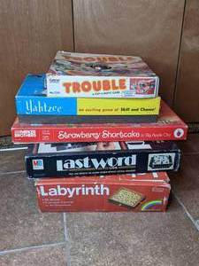 lot 107 image: Assortment of (5) Vintage Board Games - Trouble, Yahtzee, Strawberry Shortcake, Labyrinth, Last Word