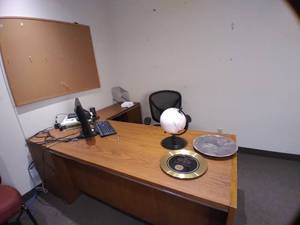 lot 768 image: Office or Student Desk & Credenza, Monitor, Corkboard, Mirror, Globe and Other Office Supplies & Decor