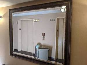 lot 113 image: Large Beveled Edge Mirror