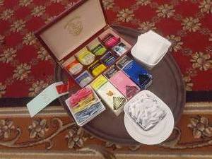lot 663 image: Collection of Bigelow Tea Bags, Sweetener, Napkins on Serving Tray