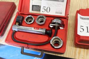 lot 50 image: Snap-on Cooling System Tester  with 45mm Adapters, Instructions, Plastic Case