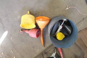 lot 129 image: Plastic Funnels, Metal Can