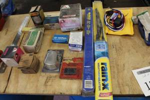 lot 171 image: Lot of Automotive Parts  - Wiper Blades, Brake Covers, Distributor Cap, Filtering Funnel No. 1 Coleman, Schrader Valve, UR Connector 3M, and more