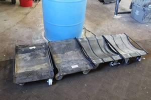 lot 186 image: Lot of (4) Car Wheel Dollies