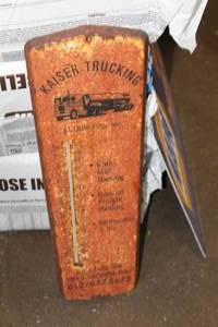 lot 206 image: Vintage Kaiser Trucking Metal Thermometer Sign