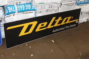 lot 203 image: Delta Authorized Tire Dealer Metal Sign