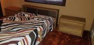 lot 31 image: Vintage Conant Ball Queen Bed with Storage Headboard