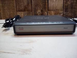 lot 125 image: Cisco VG204 with power supply