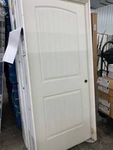 JELDWEN 2 PANEL ROUND TOP PLANK DOOR-LEFT HAND