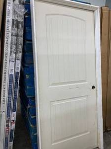 JELDWEN 2 PANEL ROUND TOP PLANK DOOR-LEFT HAND