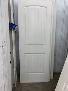 JELDWEN SANTA FE 2 PANEL ROUND-NO BORE DOOR