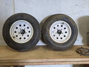 Pair of ST17580D13 Tires and Rims - Tires look almost new - Rims are 5x5-14 - Center hub is 3-14 Diameter