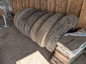 (Lot of 7) 10.00-20 Rims and Tires