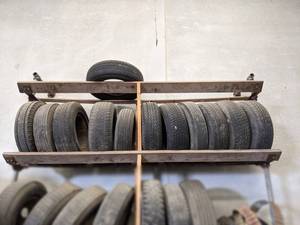 (Lot of 12) Assorted Car and Truck Tires on Top Shelf