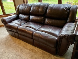 lot 71 image: Brown Reclining Leather Sofa