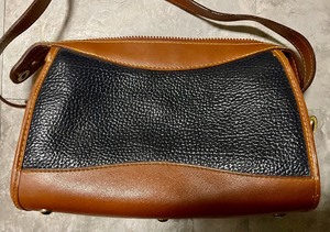 lot 99 image: Navy Dooney & Bourke Purse