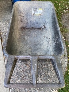 lot 142 image: Rubbermaid 7.5 Cubic Foot Commercial Wheelbarrow