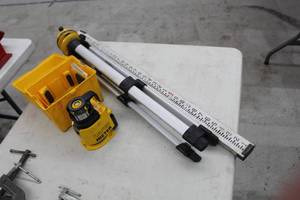 lot 77 image: Surveyor Tools  with Laser Meter Level, Tripod Stand, Measuring Stick, Plastic Case