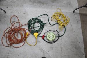 lot 144 image: Lot of (5) Electric Cords  - Extension Cords (x3), Multi-Plugs (x2)