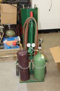 lot 10 image: Acetylene-Oxygen Acetylene-Oxygen Torch Set  with Tanks, Tank Cart, Gauges, Valves, Hoses and Tank Chain