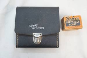 Loupe and voltage tester