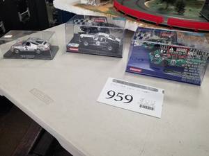 lot 959 image: Lot of (3) Carrera Slot Cars 132  - Porche 917K #35 Watkins Glen 6h 1970, Ford Mustang GT No. 67, Playboy Collection Cover 1997 Victoria Silverstedt #2 - In Display Cases